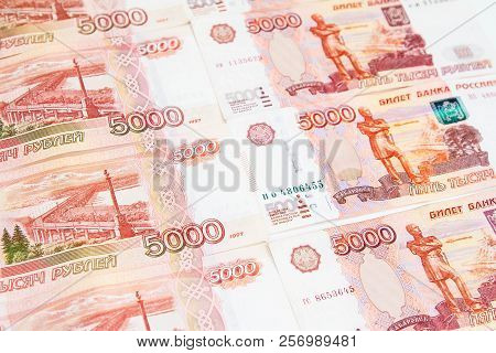 Five Thousandth Banknotes. Russian Rubles Neatly Lined In A Row