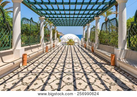 Rhodes, Greece - May 13, 2018: Walkway With Pergola In Thermal Springs Of Kallithea In Rhodes. Greec