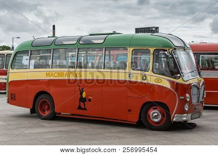 Glasgow, Scotland, Uk - June 17, 2012: Along River Clyde, Outside Riverside Museum Antique Red, Gree
