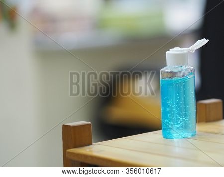 Hand Wash Gel In Plastic Bottle On Wooden Desk, Clean To Prevent Germs Protect Colona Virus, Covid 1