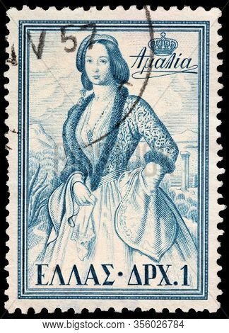 Luga, Russia - October 15, 2019: A Stamp Printed By Greece Shows Queen Consort Of Greece Amalia Wear