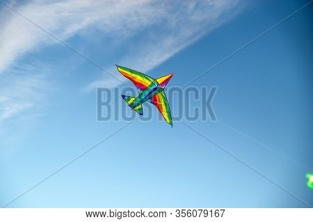 A Colorful Kite Flying In The Sky Is A Symbol Of Freedom And Equality Of Free Sexual People. Airplan