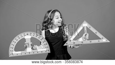 Learn Mathematics. Theorems And Axioms. Smart And Clever Concept. Girl With Big Ruler. School Studen