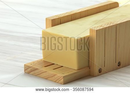 Display Of A Variety Of Soaps On Linen Background