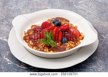 Pana Cotta With Nuts, Caramel And Fruit