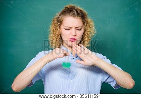 High School Classes. College Student Performing Chemical Reaction. Chemical Liquid Smelling Really B