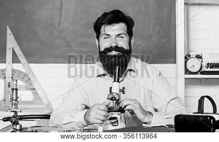 Bearded Man Teacher. Back To School. Science Experiments With Microscope In Lab. Biology Education. 