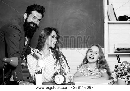 Tutor For Excellence. Extra Classes. Gifted Child. Little Girl Studying With Team Of Tutors. Home Tu