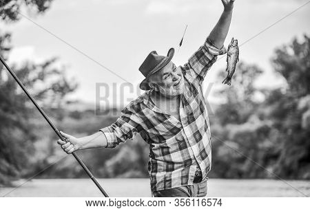 Pensioner Leisure. Fish On Hook. Man Senior Fisherman. Fisherman Fishing Equipment. Fisherman Alone 