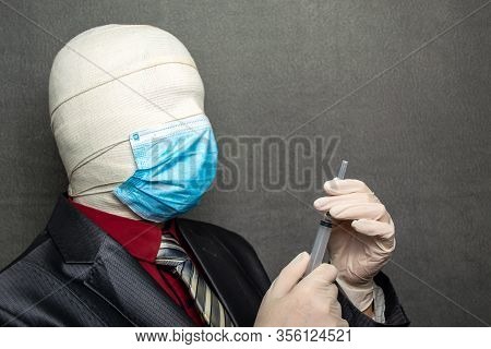 Incognito Man In A Medical Mask Is Dressed In A Business Suit
