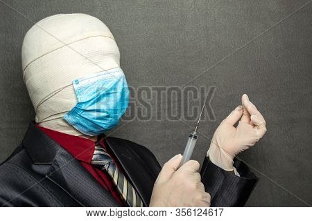 Incognito Man In A Medical Mask Is Dressed In A Business Suit