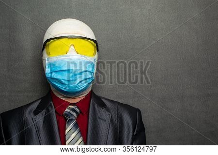 Incognito Man In A Medical Mask Is Dressed In A Business Suit