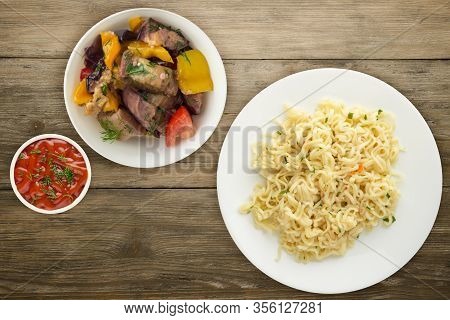 Vermicelli On A White Plate On Wooden Background. Vermicelli On A Plate With Vegetarion Salad Top Vi