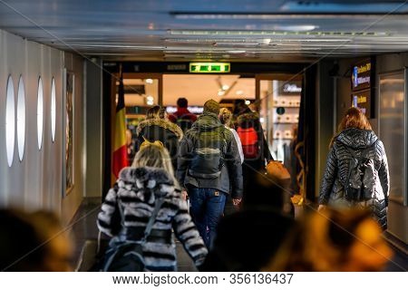 Otopeni, Romania - February 25, 2020: Passengers Inside Henri Coanda International Airport, Near Buc