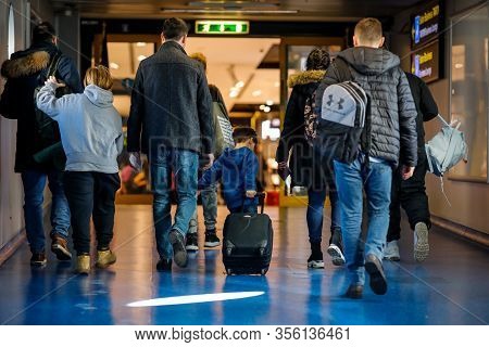 Otopeni, Romania - February 25, 2020: Passengers Inside Henri Coanda International Airport, Near Buc