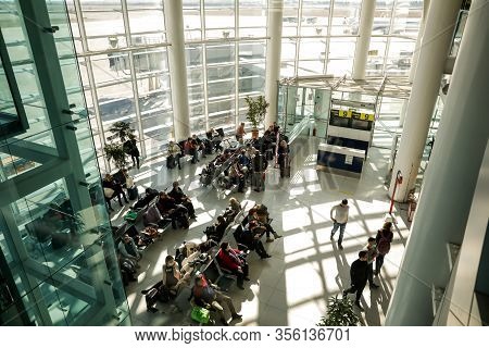 Otopeni, Romania - February 25, 2020: Passengers Inside Henri Coanda International Airport, Near Buc