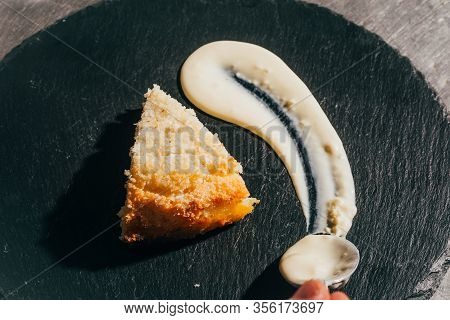 Cheesecake With Almonds And Coconut Shvings On Top