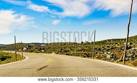 Road Crossing Hardangervidda Plateau, Norway Landscape. National Tourist Hardangervidda Route.