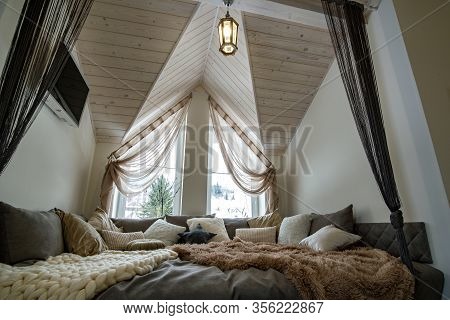 Interior Of A Modern House Spacious Hallway With Big Soft Resting Place. Contemporary Wide Sofa With