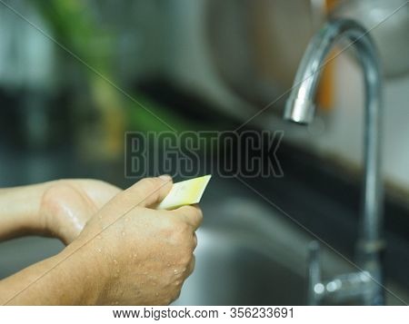 Olympusa Woman Standing And Washing Her Hands At The Sink To Prevent Germs Protect Colona Virus, Cov