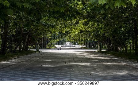 Asjchabad, Turkmenistan - June 1, 2019: Empty Parks In Turkmenistan With Fallen Tricycle.