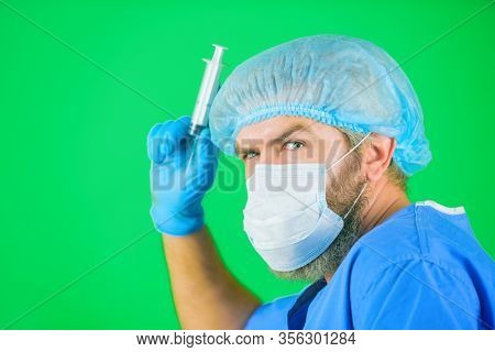 Syringe. Crazy Doctor With Syringe. Coronavirus. Doctor Makes Vaccination. Vaccination For People. I