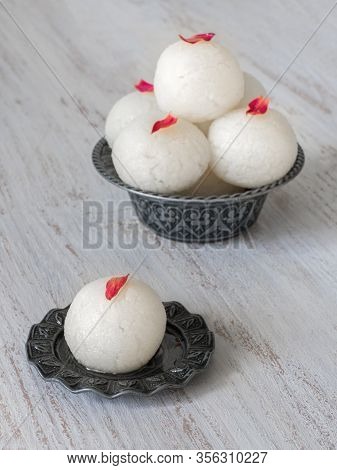 Close Up Indian Rasgulla Dessert. Sweet Served In A Bowl