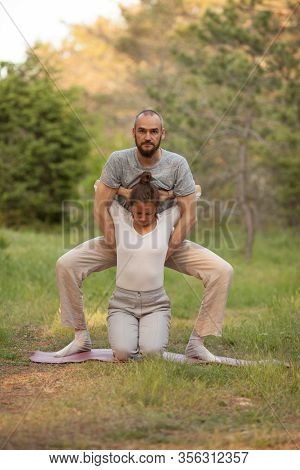 Yumeiho Massage. Masseur Young Man Doing Oriental Japanese Massage Yumeiho Girl. Concept Of Health, 