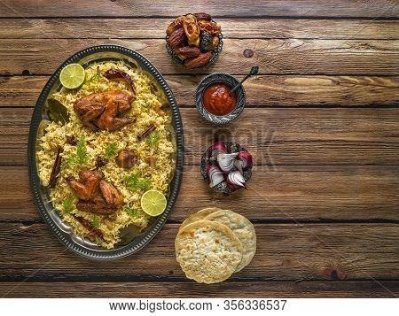 Arab- Mandi Rice. Yemenis Style. Festive Dish With Baked Chicken And Rice. Top View, Copy Space.
