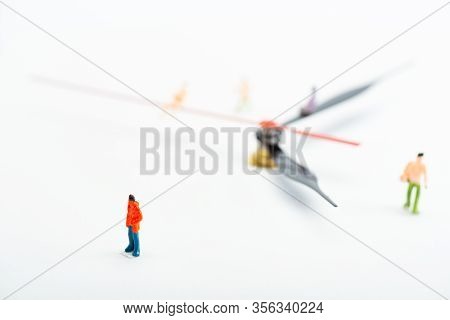 Selective Focus Of People Figures And Black And Red Arrows Of Watch On White Background, Concept Of 