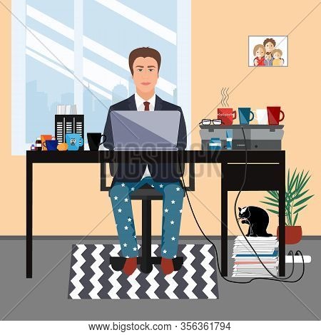 Middle Aged Businessman In A Suit Jacket And Pajama Bottoms Working From Home Using Laptop Computer.
