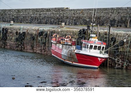 Mullaghmore, Ireland- Feb 23, 2020: Fishing Boats Moored In Mullaghmore Harbour