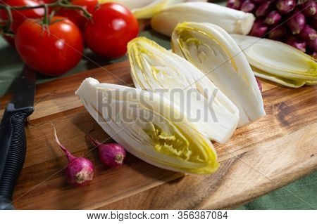 Fresh Belgian Endive Or Chicory Bitter Salad Ready To Cook Or Eat