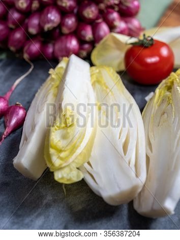 Fresh Belgian Endive Or Chicory Bitter Salad Ready To Cook Or Eat