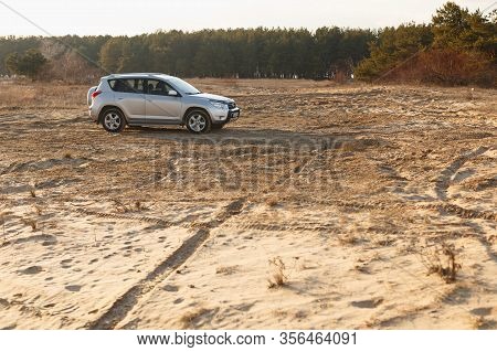 Dnipro, Ukraine - February 19, 2020: Toyota Rav4 2006 Gray Color Among The Sand Near The Forest, Ope
