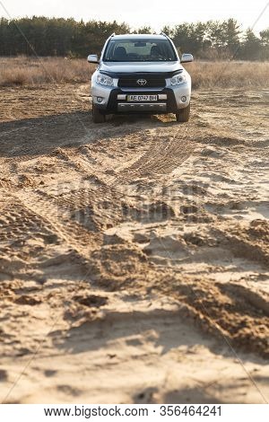 Dnipro, Ukraine - February 19, 2020: Toyota Rav4 2006 Gray Color Among The Sand Near The Forest, Ope