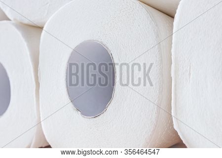 Rolls Of White Toilet Paper Close-up. The Concept Of Personal Hygiene, Sanitation.
