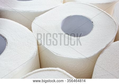 Rolls Of White Toilet Paper Close-up. The Concept Of Personal Hygiene, Sanitation.