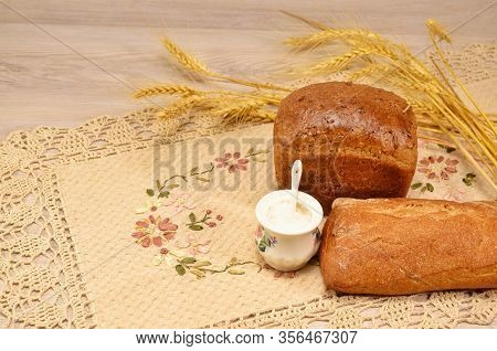 Ruddy And Delicious Bread With Salt On A Linen Napkin