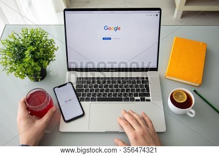 Anapa, Russia - February 22, 2020: Man Hand On Macbook Pro 16 And Iphone 11 In The Table With Social