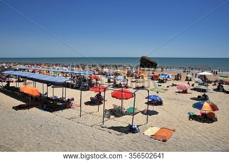 Matalascanas, Spain - July 10, 2011:matalascanias Beach With The Overturned Yeger Tower Visible In T