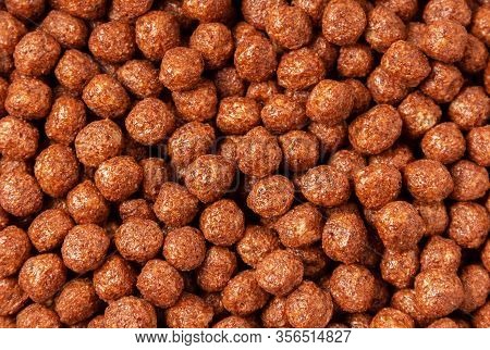 Сereal Crispy Round Chocolate Balls Texture. Delicious Energy Food For An Active Life