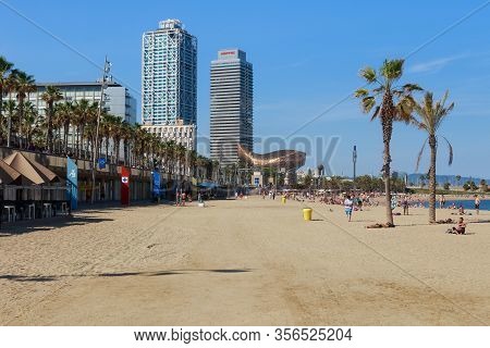 Barcelona, Spain - May 15, 2017: View Of The City Beach In Barcelona On The Mediterranean Sea. With 