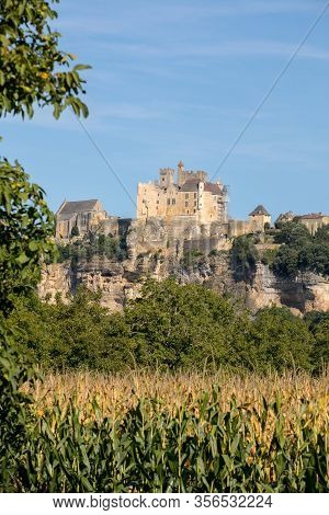 The Medieval Chateau De Beynac Rising On A Limestone Cliff Above The Dordogne River. France, Dordogn