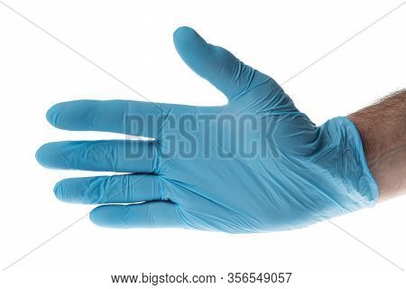 Hand With A Blue Latex Glove, Isolated On White