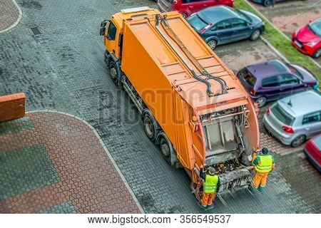 Urban Recycling Waste And Garbage Services . Orange Truck, Garbage Removal .