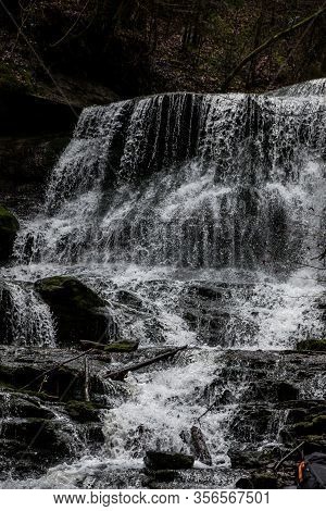 Little Waterfall Down The Canyon In The Middle Of The Green Forest