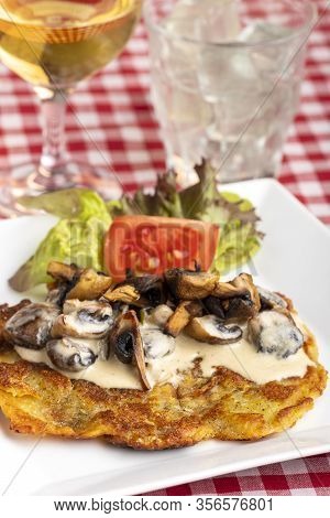 Swiss Roesti With Mushroom Sauce And Wine