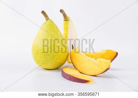 Tasty Fruit Snack - Fresh And Sweet Pears With Flat Peach - Pear Slices And Flat Peach Slices