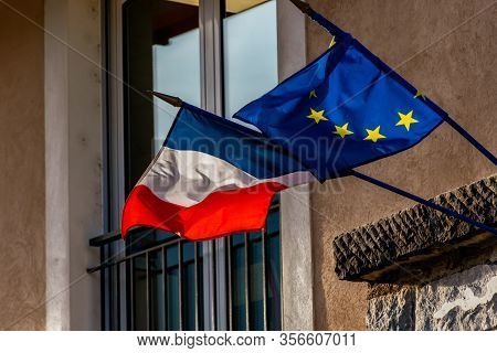 The Official European Union Flag And The French Republic National Flag Side By Side Waving In The Wi
